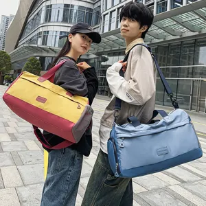 Large capacity travel duffel bag with wet dry separation for gym sports fitness and outdoor weekend.