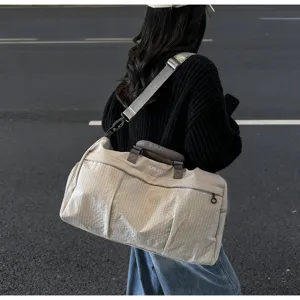 Large capacity waterproof travel duffel bag for gym, sports, and outdoor leisure activities.