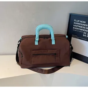 Large capacity casual travel fitness duffel bag with blue handles and shoulder strap