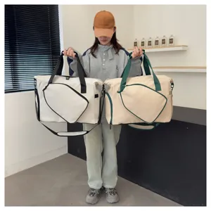 Grand sac de sport pour raquette de tennis avec compartiment à chaussures séparé pour le sport.