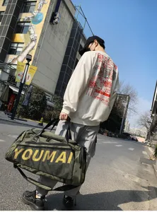 Grand sac de voyage de sport militaire tactique pour fitness et voyages en plein air.