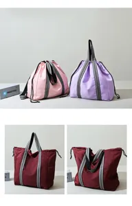 Detail shot of large capacity Oxford cloth travel bag showing drawstring design and sturdy straps.
