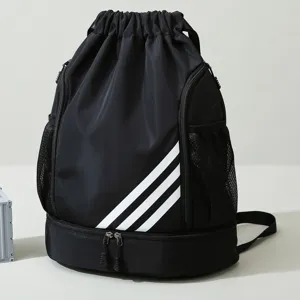 Black basketball drawstring backpack with separate shoe compartment and mesh side pockets.