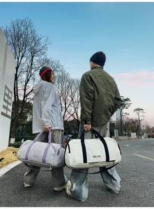 Large capacity travel duffel bag with separate wet pocket, stylish color block sports gym bag.