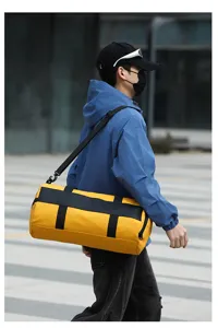 Large capacity fitness gym duffel bag with shoulder strap, stylish waterproof sports bag for travel.