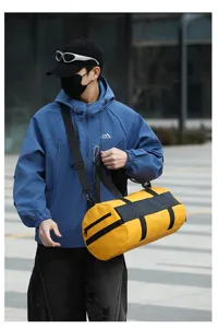 Detailed view of the yellow large capacity gym duffel bag with dry wet separation for travel.