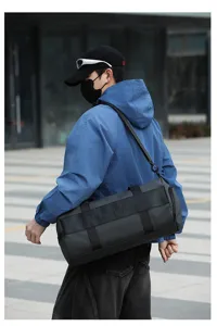 Detailed view of a large capacity waterproof gym duffel bag for men and travel storage use.