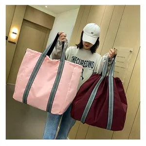 Large capacity oxford cloth travel bag, multi-use shoulder luggage bag for casual outdoor use.