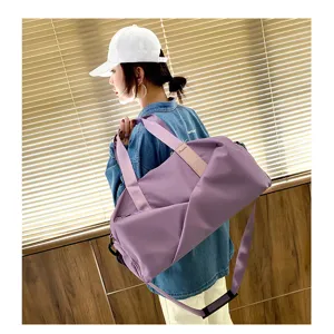 Grand sac de sport avec compartiment chaussures, sac de voyage de grande capacite pour tous.