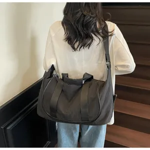 Large capacity black oxford cloth travel duffel bag lightweight gym yoga bag for women.