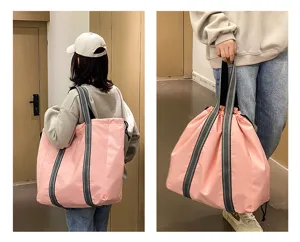 Large capacity oxford cloth travel bag, pink casual tote with convenient drawstring for daily use.
