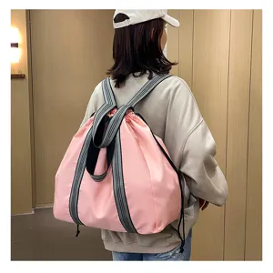 Pink oxford cloth travel backpack with dual straps, large capacity casual daypack for women.