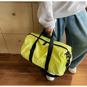 Neon yellow travel duffel bag waterproof gym sports shoulder crossbody bag for daily use.