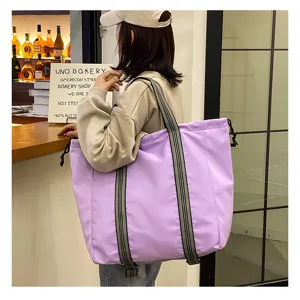 Large capacity oxford cloth travel bag, stylish purple multi-use shoulder bag for casual use.