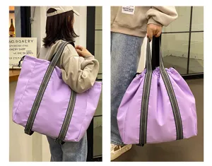 Large capacity nylon travel backpack, casual shoulder bag for women, purple daily use.
