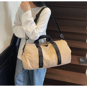 Detailed view of the casual travel duffel bag showcasing durable fabric and sturdy straps.