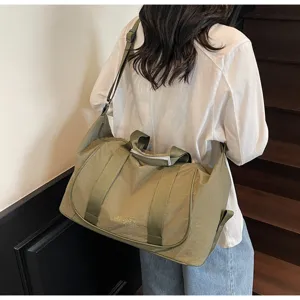 Detail view of the lightweight oxford cloth travel duffel bag, perfect for yoga and fitness.