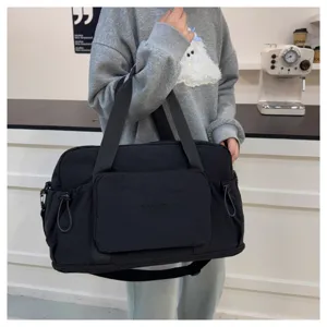 Grand sac de voyage pliable avec séparation humide et sèche pour le sport et les déplacements.