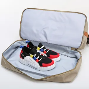 Grand sac de voyage avec compartiment de separation humide et sec pour courts sejours.