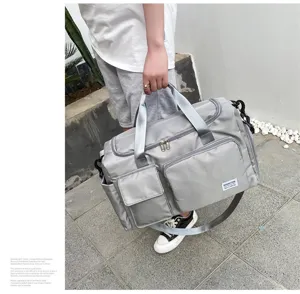 Large capacity gym duffel bag with shoe compartment, oxford cloth travel luggage bag detail.