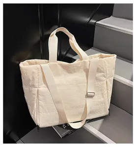 Minimalist casual tote bag with spacious capacity and shoulder straps for daily commuting.