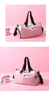 Pink gym duffel bag with dry wet separation compartment, black straps and handles for yoga sport.