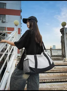 Outdoor casual sports gym bag detail showcasing large capacity dry wet separation and mesh pocket.