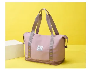 Pink large capacity travel duffel bag with wet dry separation and expandable bottom layer.