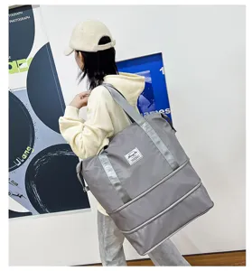 Expandable travel duffel bag with wet dry separation large capacity gym tote for sports fitness.