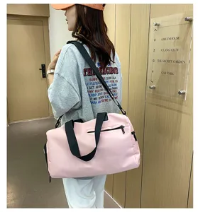 Pink fitness gym bag for women with separate shoe compartment and waterproof oxford cloth travel duffel.
