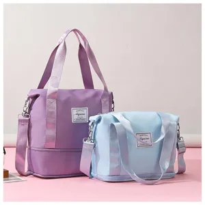 Detailed view of the women's compact travel fitness bag with adjustable shoulder strap.