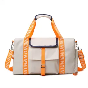 Bolso deportivo grande de lona bolsa de viaje fitness con correas de color contrastante y bolsillos.