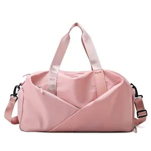 Sac de sport rose pour femme, grand sac de voyage étanche avec compartiment chaussures.
