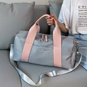 Large capacity travel duffel bag with shoe compartment, waterproof gym bag for sports and yoga.