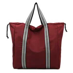 Large capacity oxford cloth travel tote bag front view in burgundy color for casual use.