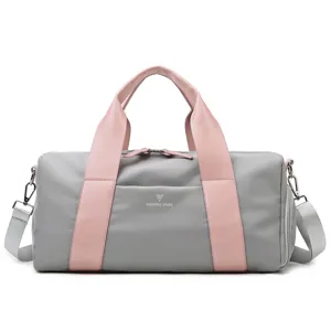 Large capacity sports gym duffel bag in gray and pink, front view for travel and fitness.