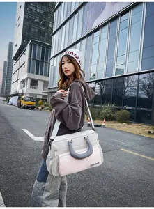 Large capacity travel duffel bag for women and men, waterproof sports fitness gym shoulder bag.