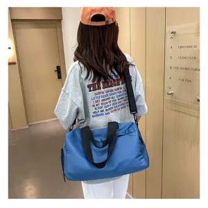 Casual blue gym bag for women with separate shoe compartment and dry wet separation.