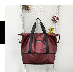 Grande borsa da viaggio impermeabile con separazione umido secco e scomparto scarpe.