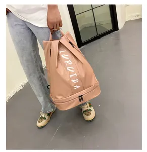 Zaino in pellicola di pelle impermeabile con scomparto scarpe per viaggi e palestra.