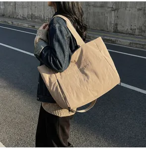 Large capacity casual khaki tote bag, stylish shoulder bag with zipper for daily commuting.