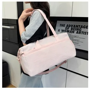 Large capacity pink gym duffel bag, casual sports travel luggage with comfortable shoulder strap.