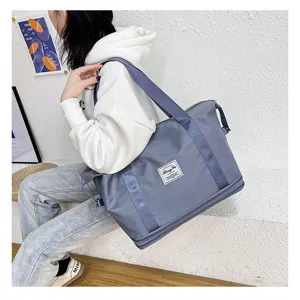 Large capacity travel gym bag with double layer expansion design for casual daily use.
