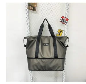 Borsa da viaggio fitness espandibile con separazione bagnato asciutto e tessuto in nylon.