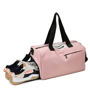 Pink dry-wet separation gym duffel bag with independent shoe compartment for women.