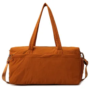 Large capacity sports gym duffel bag for women, waterproof travel nylon shoulder bag.