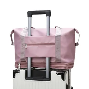 Pink travel duffel bag with trolley sleeve expandable gym bag waterproof weekend bag