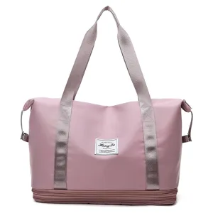 Pink travel duffel bag with bottom expansion layer, large capacity fitness bag for daily sports.
