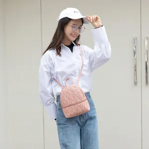 Modische Damen rosa kleiner Rucksack stilvoller Buchstabendruck Freizeit Umhängetasche
