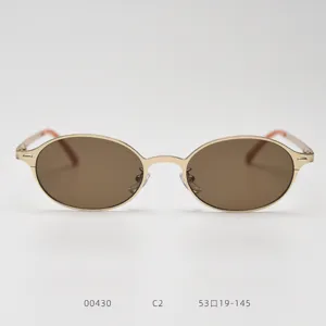 Lunettes de soleil ovales metalliques vintage pour femme et homme, verres marron detail.